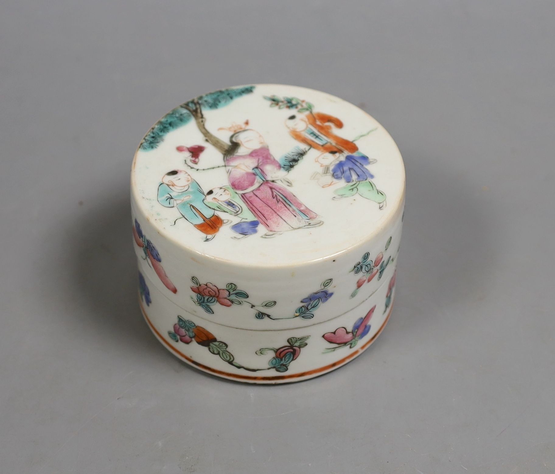 A 19th century Chinese famille rose box and cover, Liberty retail label, 9.5 cms diameter.